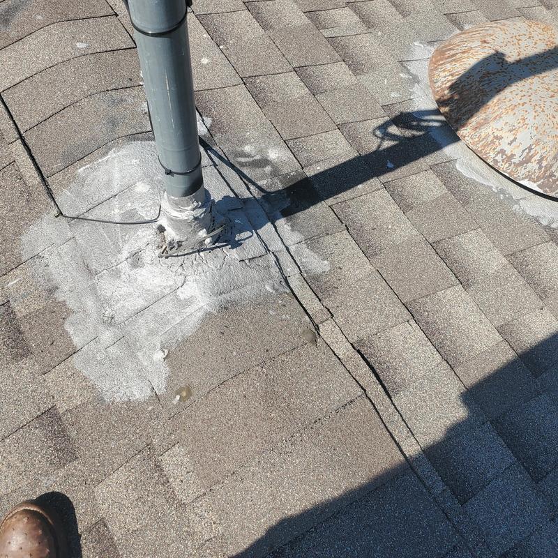 Roof vent pipe flashing and shingle hail damage repair area