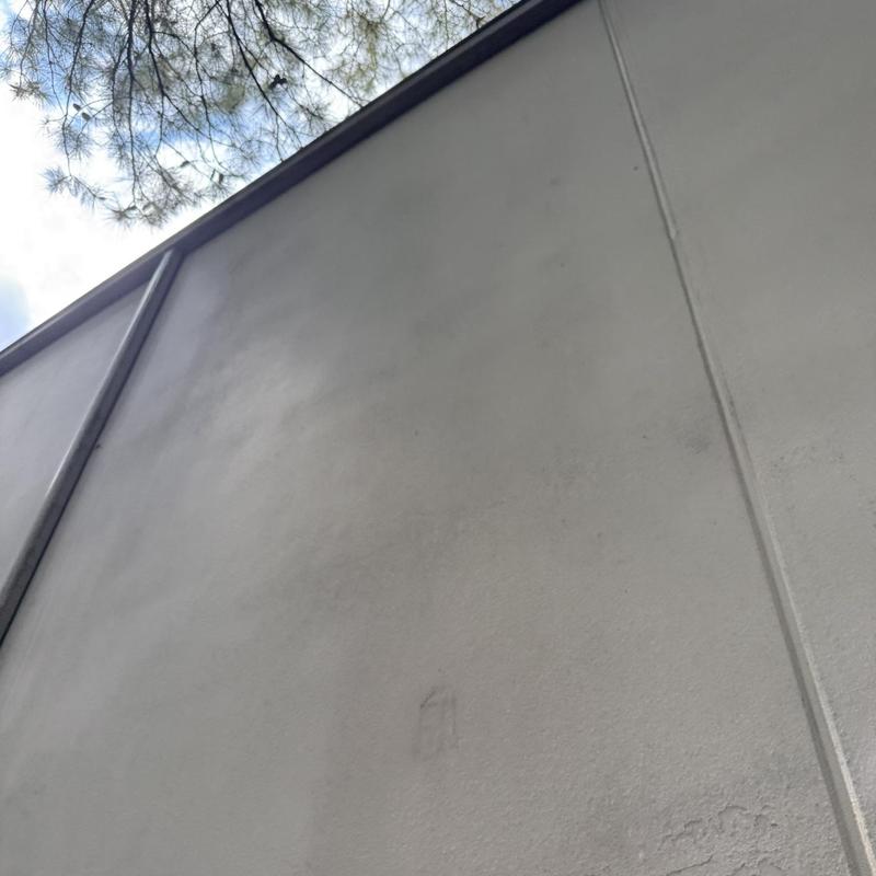 Commercial grade aluminum downspouts on building exterior