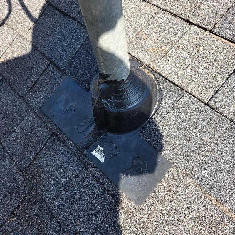 Zipper boot flashing on asphalt shingle roof