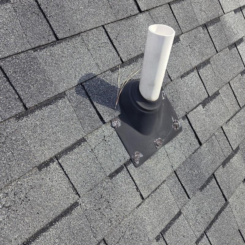 Roof pipe flashing with sealed nails on shingles