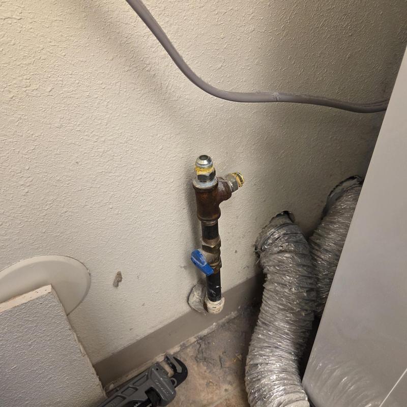 Laundry room capped gas line with valve and vent duct
