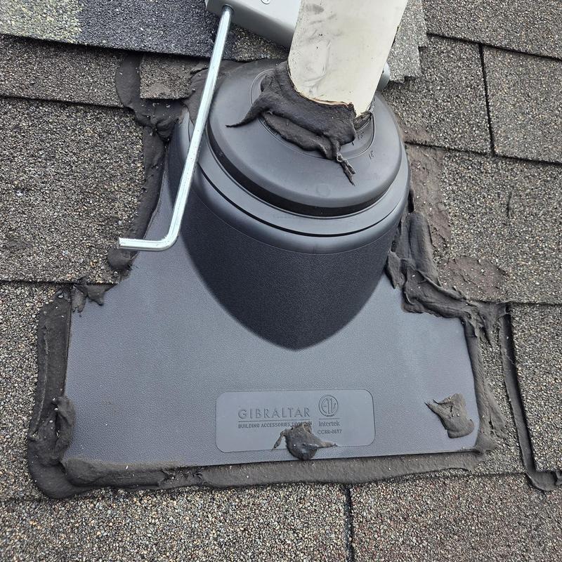 Dryer vent termination with caulked roof flashing