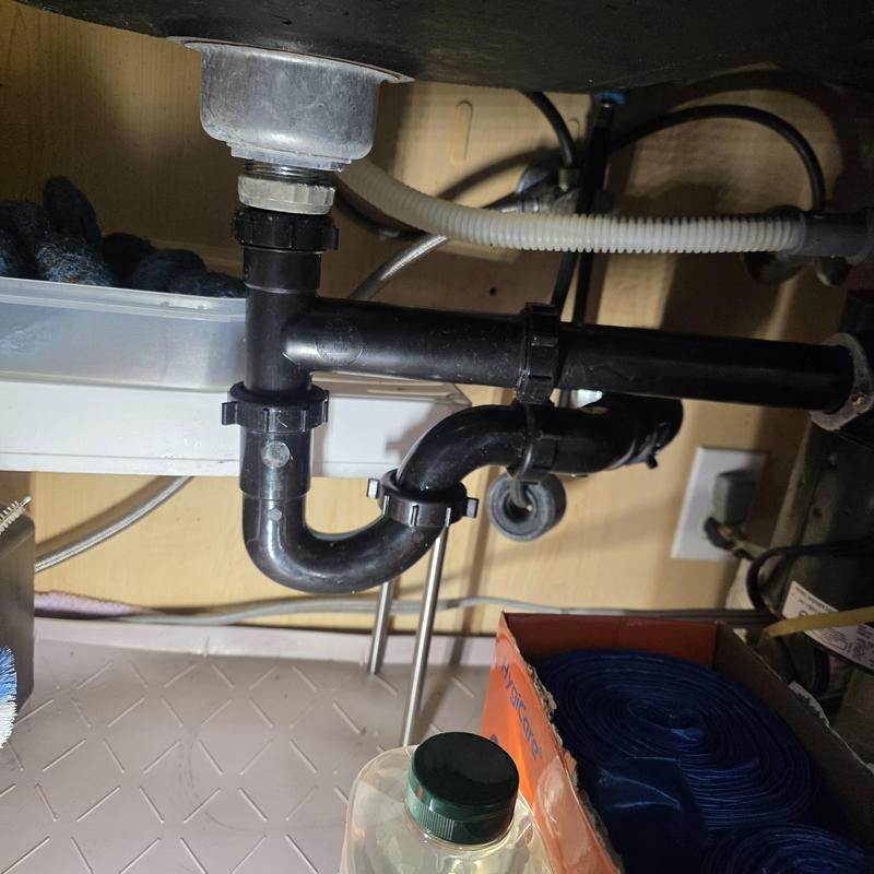 Kitchen sink P-trap and drain pipe replacement under cabinet