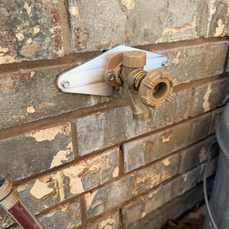 Woodford frost proof sillcock with Hose Bib Buddy plate