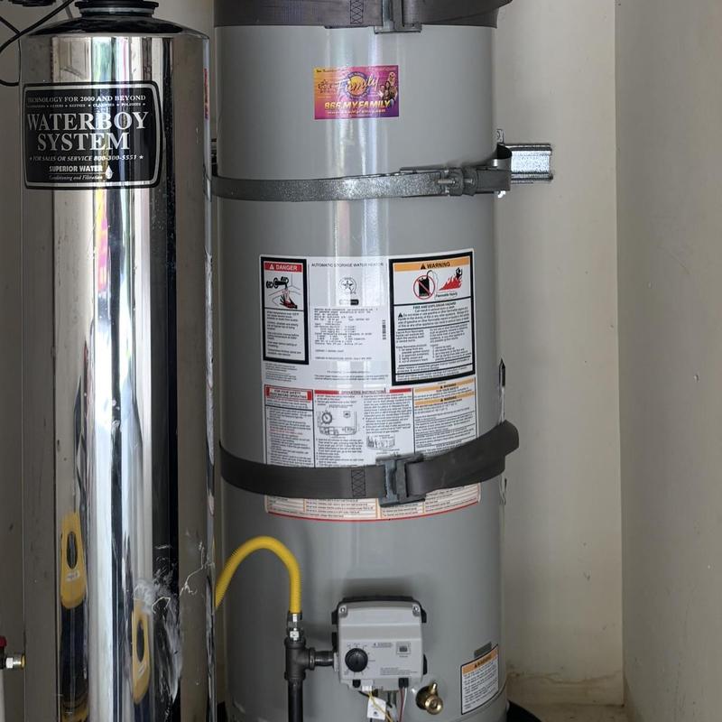 Water heater with safety straps and yellow gas line