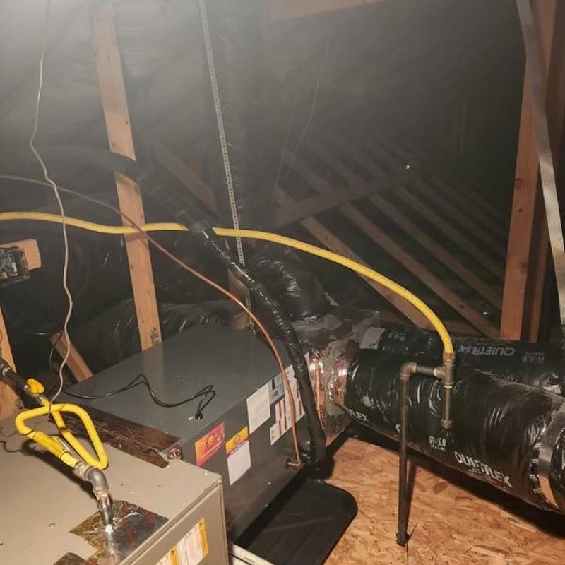 Aspen cased coil with ductwork in attic installation