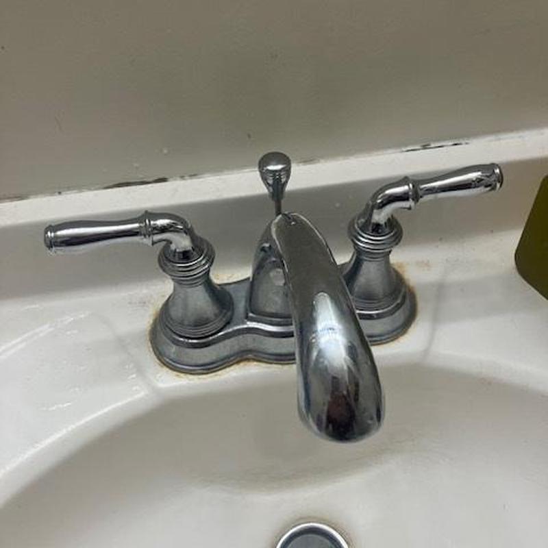 Basin faucet with two handles and drain repairs