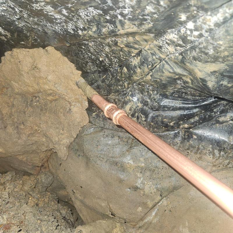 Copper water line under slab with repair solder joint