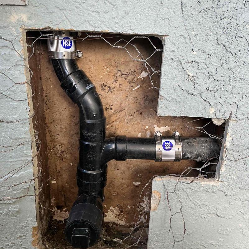 Kitchen drain piping with new clean-out access installed