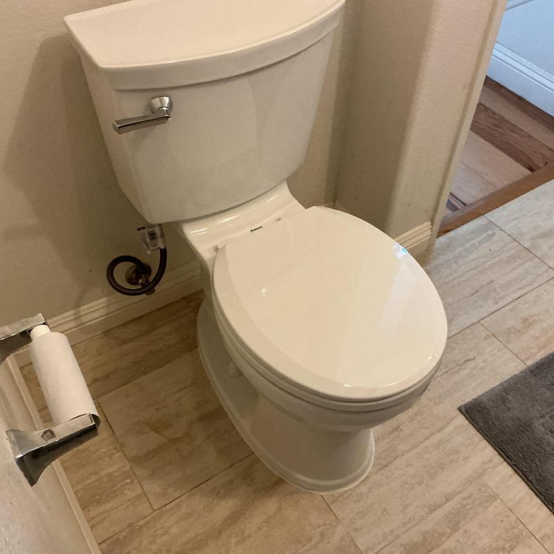 Toilet installation with new wax ring and bolts
