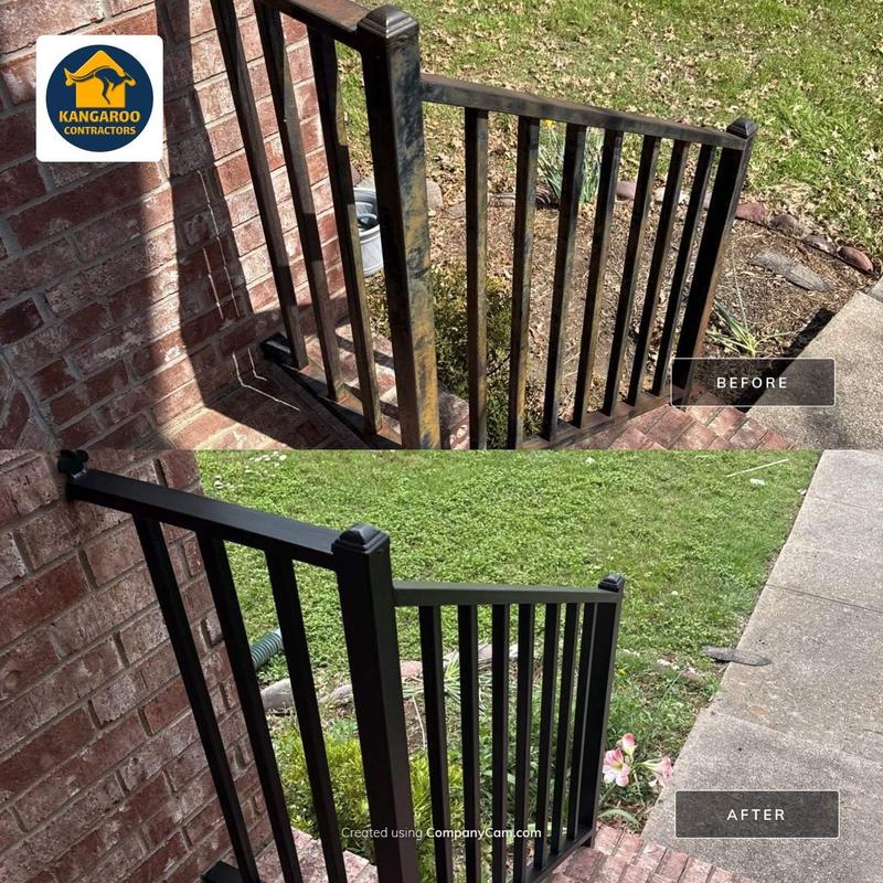 Iron stair railings with fresh black paint finish