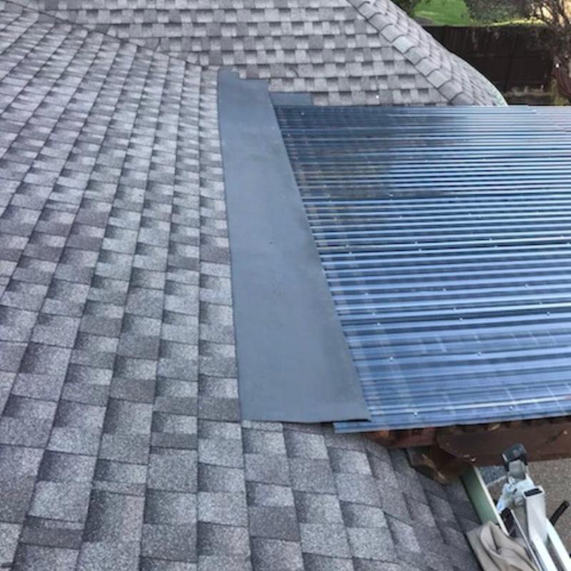 Pergola roof panels installation with shingle roof tie-in Pergola roof panels installation with shingle roof tie-in