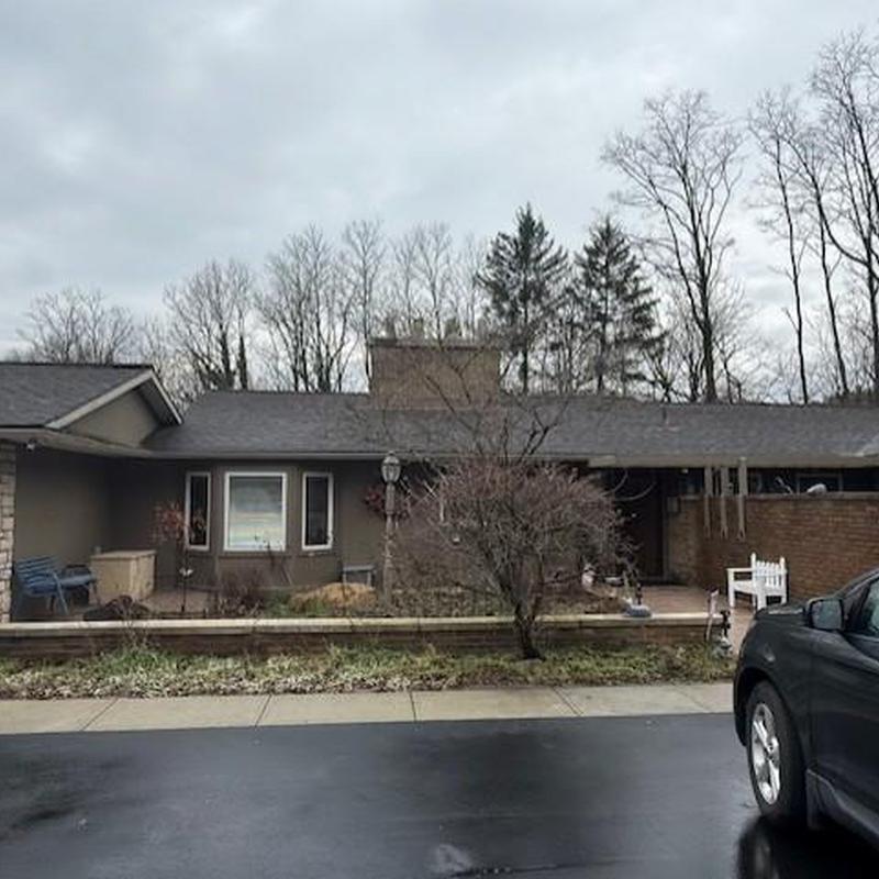 Roof shingles and chimney flashing inspection on house Roof shingles and chimney flashing inspection on house