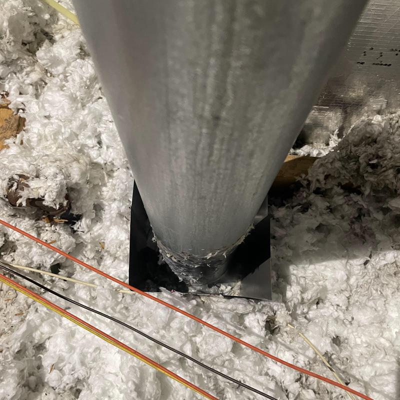 Heater pipe with cut decking and exposed insulation