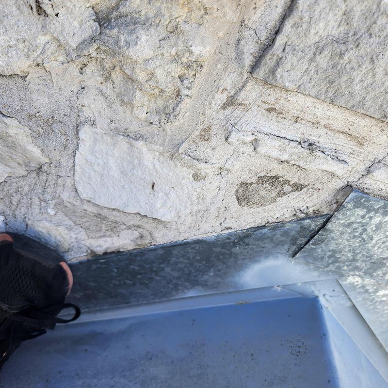 Chimney cricket on metal standing seam roof sealant Chimney cricket on metal standing seam roof sealant