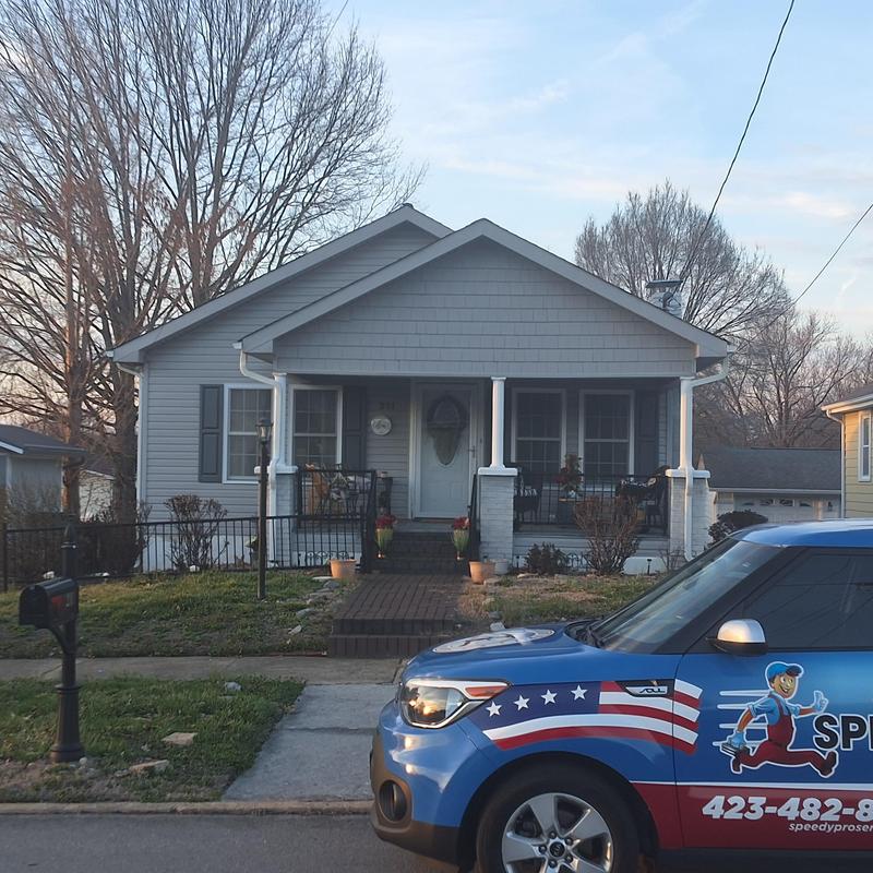 Asphalt shingle roof with wind and water damage, Blountville