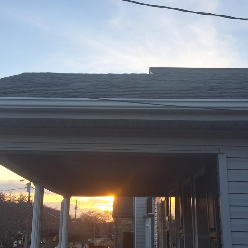 Asphalt shingle roof with white drip edge and trim