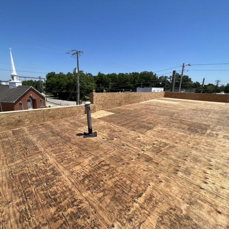 Plywood roof decking replacement on commercial building