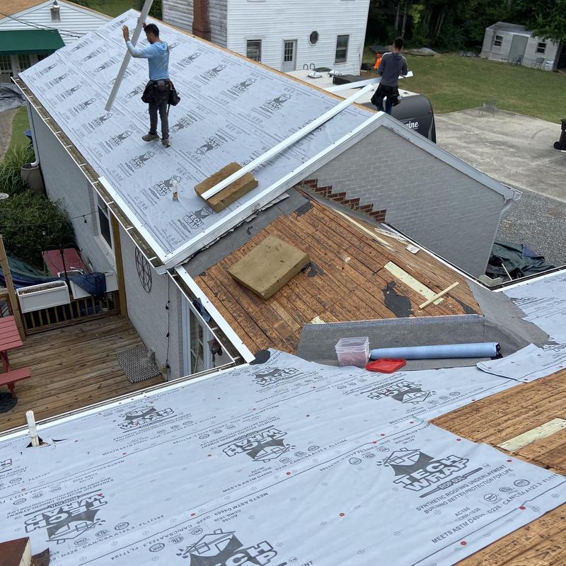 Roof decking and synthetic underlayment installation Roof decking and synthetic underlayment installation