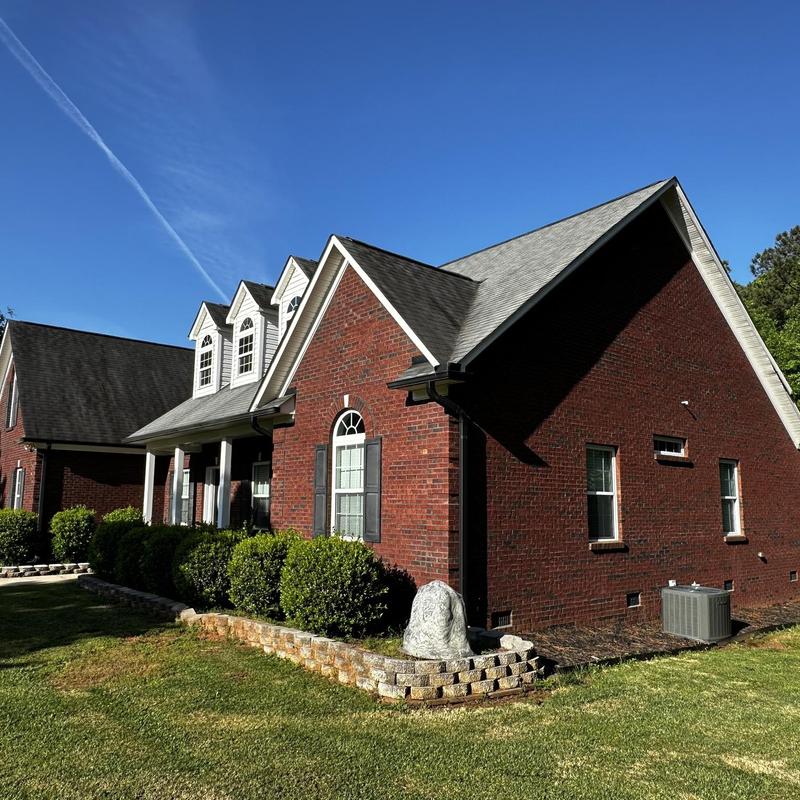 IKO Dynasty shingle roof and gutter installation on brick house IKO Dynasty shingle roof and gutter installation on brick house