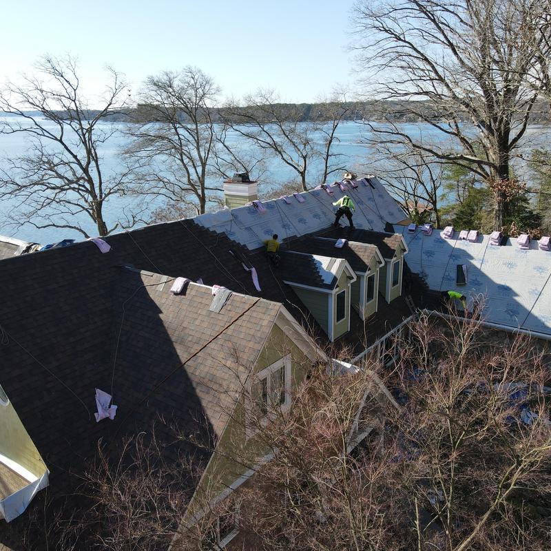 Owens Corning Duration shingle roof installation over lake