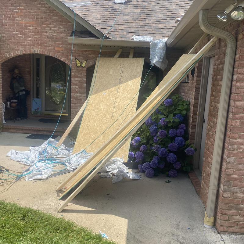 Fascia boards leaning on porch during roof project Fascia boards leaning on porch during roof project