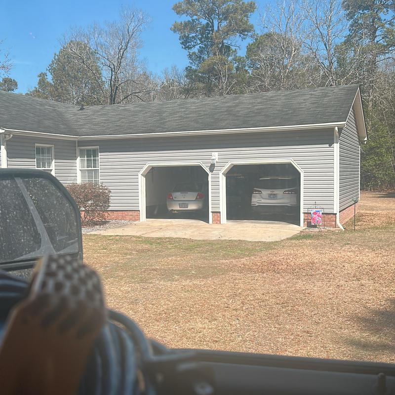 Garage door installation on residential home exterior