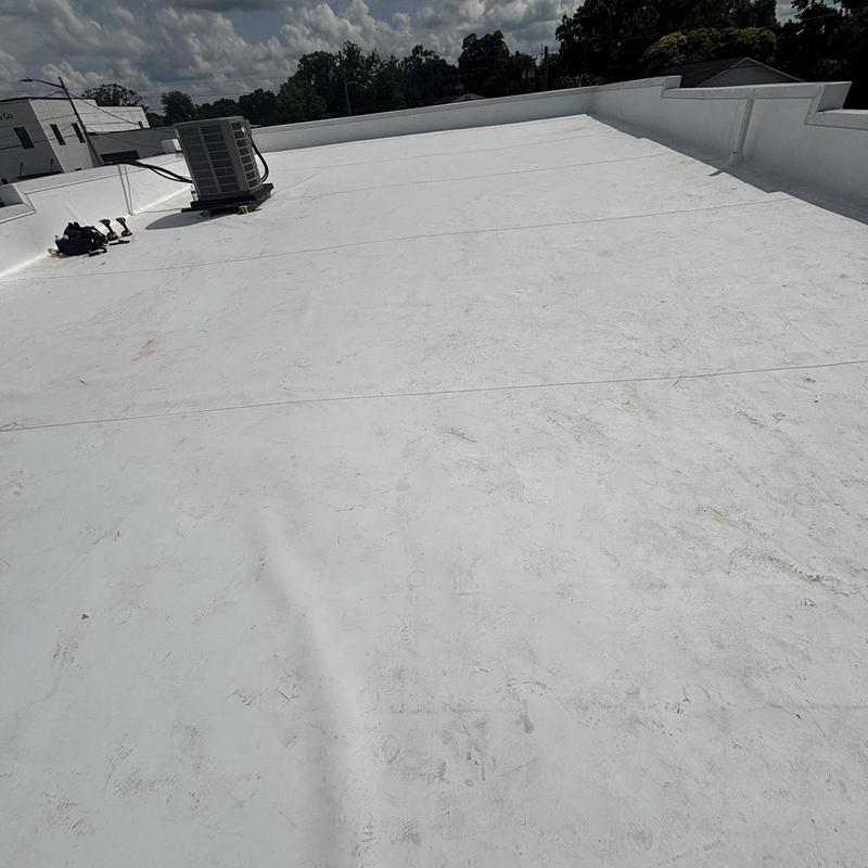 TPO roof with tapered iso board and metal coping TPO roof with tapered iso board and metal coping