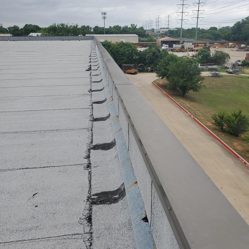 Flat roof membrane and coping damage from hailstorm