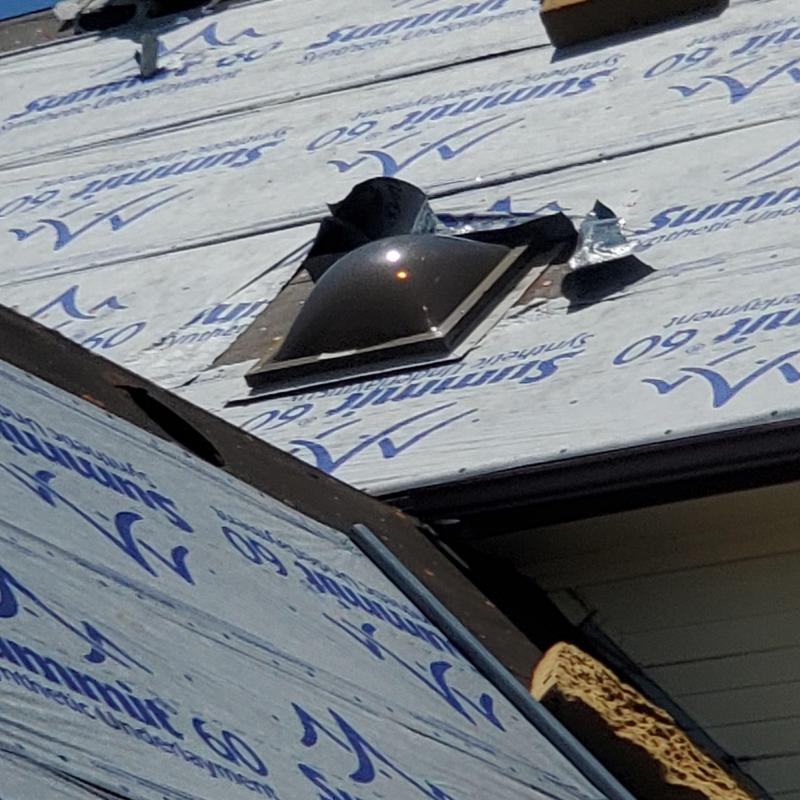Skylight and roof underlayment with hail damage