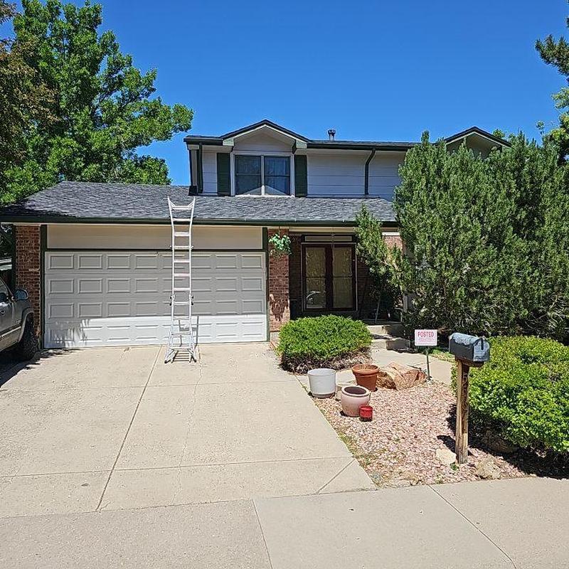 Asphalt shingle roof with ladder for hail inspection Asphalt shingle roof with ladder for hail inspection