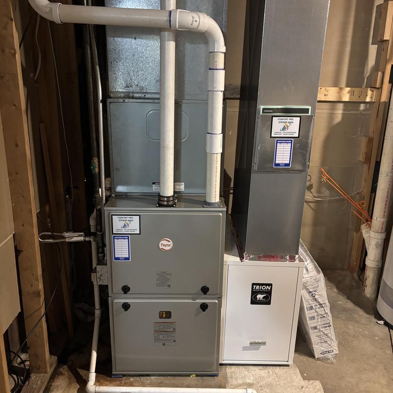 High efficiency Payne gas furnace with vent pipes