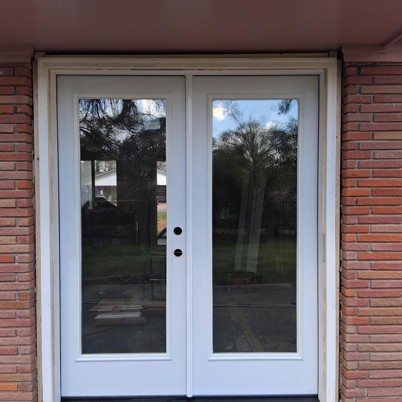 Exterior double glass doors with rebuilt frame installation