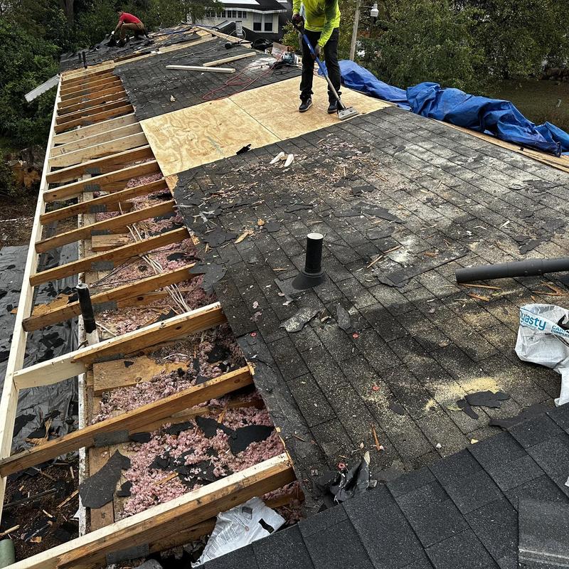 Asphalt shingle roof with damaged framing repair Asphalt shingle roof with damaged framing repair