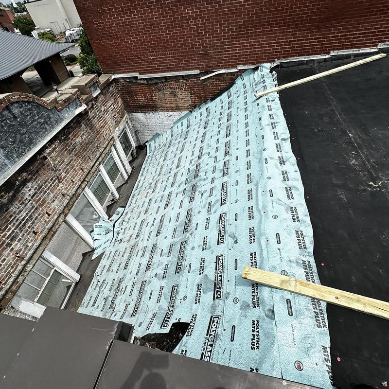 TPO roofing underlayment on historic building roof collapse repair TPO roofing underlayment on historic building roof collapse repair