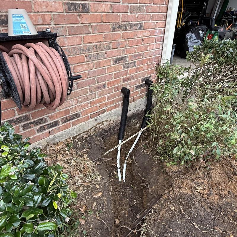 Main water line replacement with insulated piping outdoors