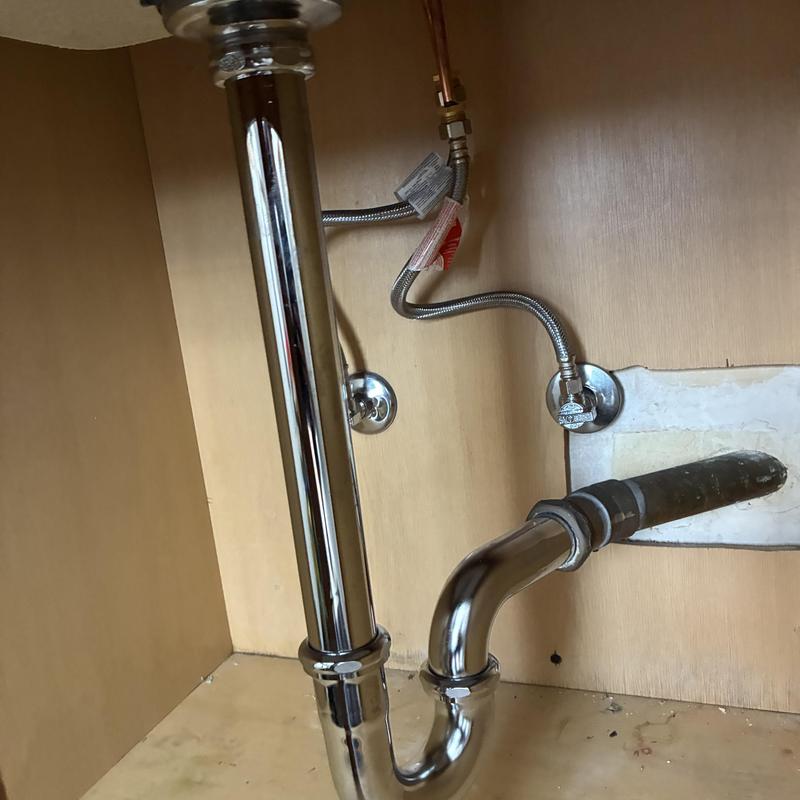 Bathroom sink drain trap and water supply lines installation