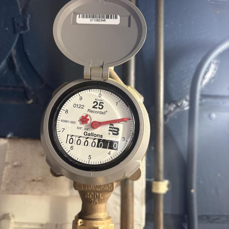 Sub meter water meter installation with sealed lid