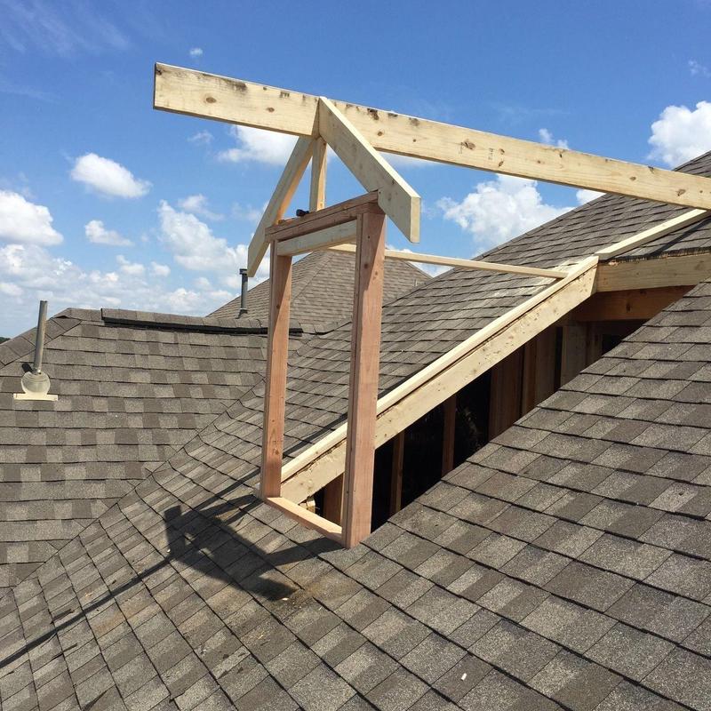Dormer window framing on shingled roof installation