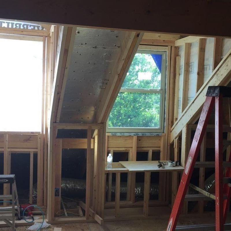 Dormer window installation and attic framing with insulation