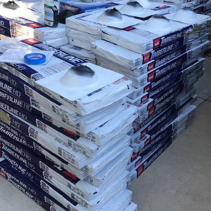 GAF Timberline HD shingles stacked for roofing job GAF Timberline HD shingles stacked for roofing job