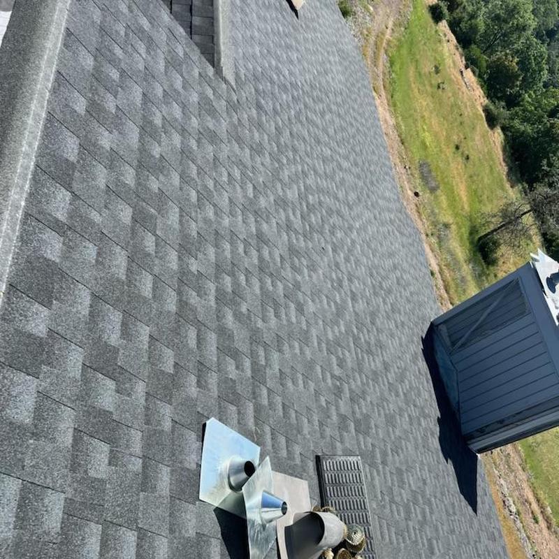 GAF lifetime asphalt roof with vents and skylight