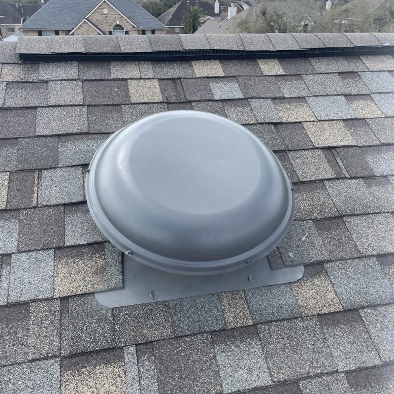 Roof vent installed on asphalt shingle roof