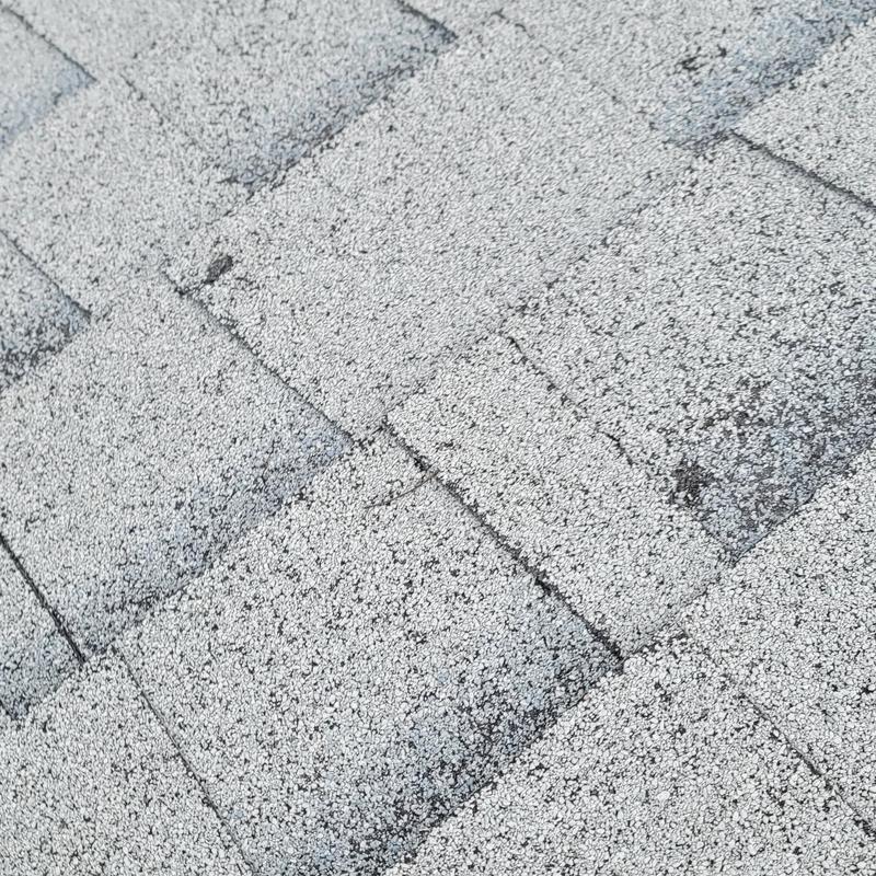 Asphalt roof shingles with hail damage granules