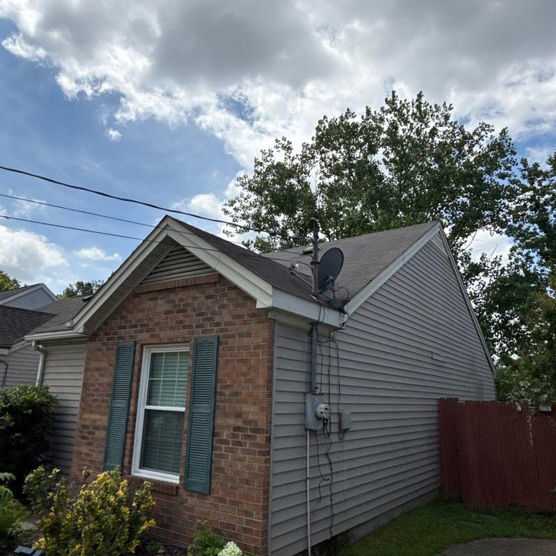 Asphalt shingle roof with hail damage and flashing evaluation