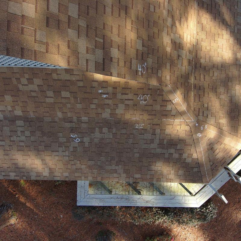 Asphalt shingle roof with marked repair estimates Asphalt shingle roof with marked repair estimates