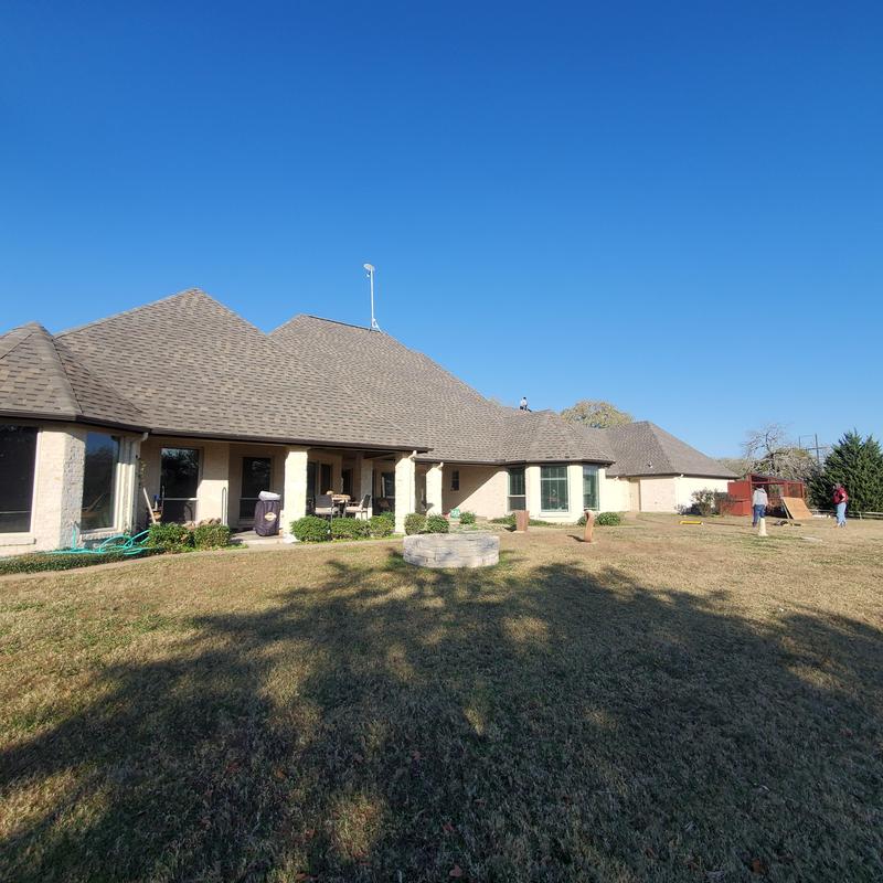 Asphalt shingle roof with hail and wind damage inspection