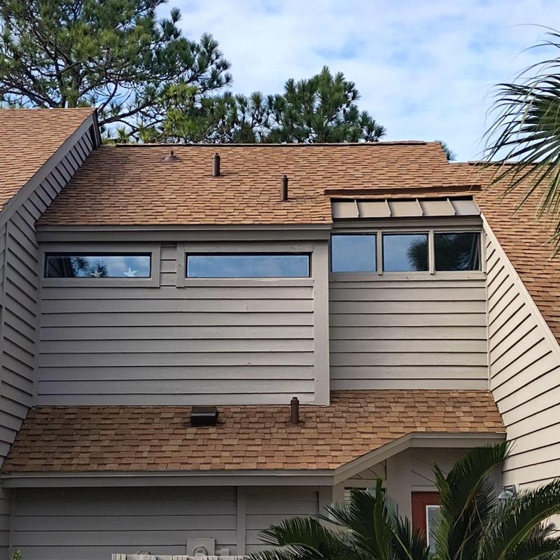 Pipe flashings with pipe protectors on residential roof Pipe flashings with pipe protectors on residential roof