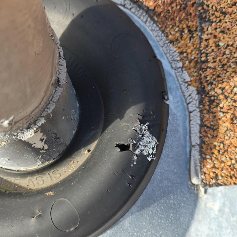 Pipe flashing rubber seal with tear and wear Pipe flashing rubber seal with tear and wear