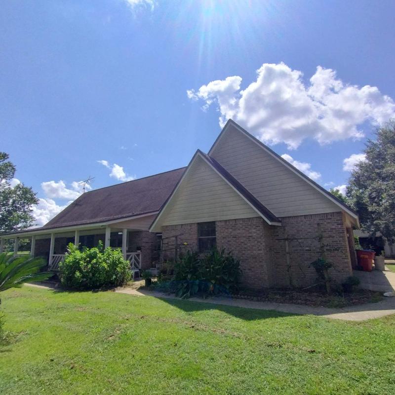 Roof shingles storm damaged with new roof planned Roof shingles storm damaged with new roof planned